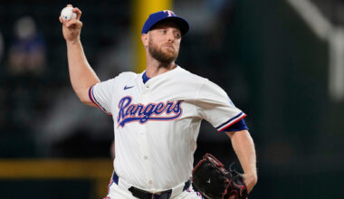 FILE - Texas Rangers starting pitcher Merrill Kelly throws to the Arizona Diamondbacks in the first inning of a baseball game, Aug. 13, 2025, in Arlington, Texas. (AP Photo/Tony Gutierrez, File)