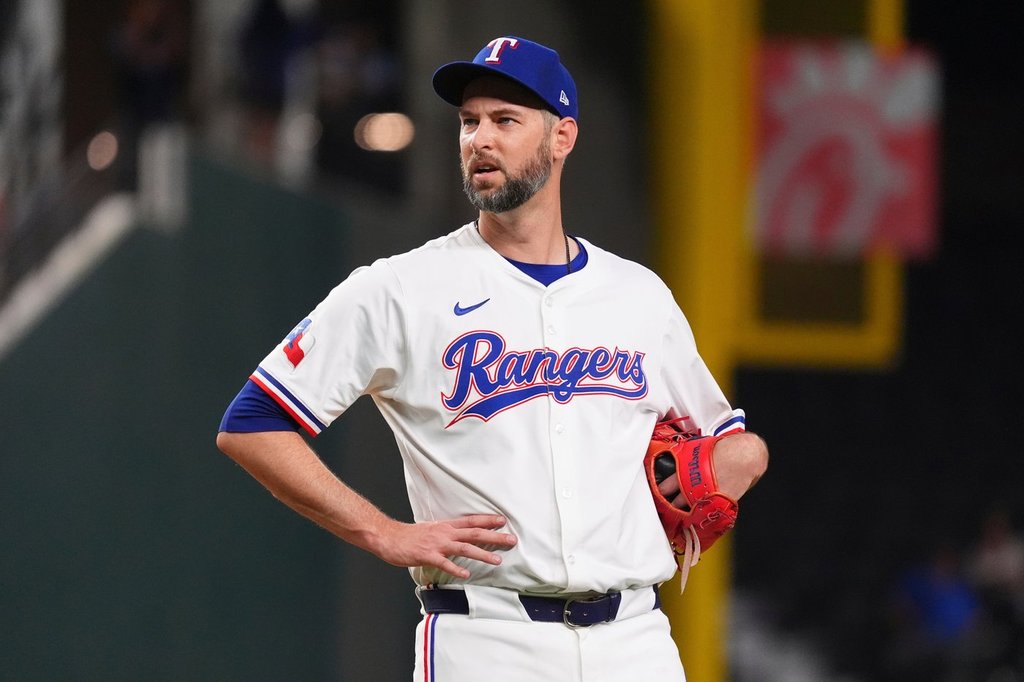 FILE - Texas Rangers pitcher Chris Martin stands on the mound just before leaving a baseball game against the Colorado Rockies, May 13, 2025, in Arlington, Texas. (AP Photo/LM Otero, File)