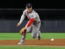 Alex Bregman of the Boston Red Sox backhands a ground ball during the second inning against the New York Yankees in Game 3 of the American League wild card series at Yankee Stadium on October 02, 2025 in the Bronx. 