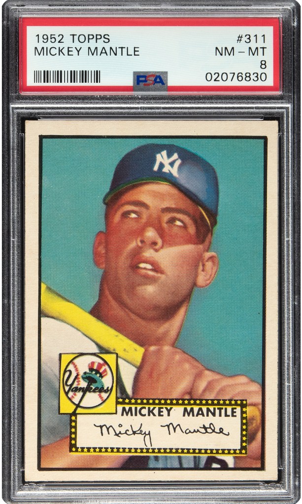 1952 Topps Mickey Mantle baseball card, graded NM-MT 8, showing Mantle in a New York Yankees cap with a bat over his shoulder.