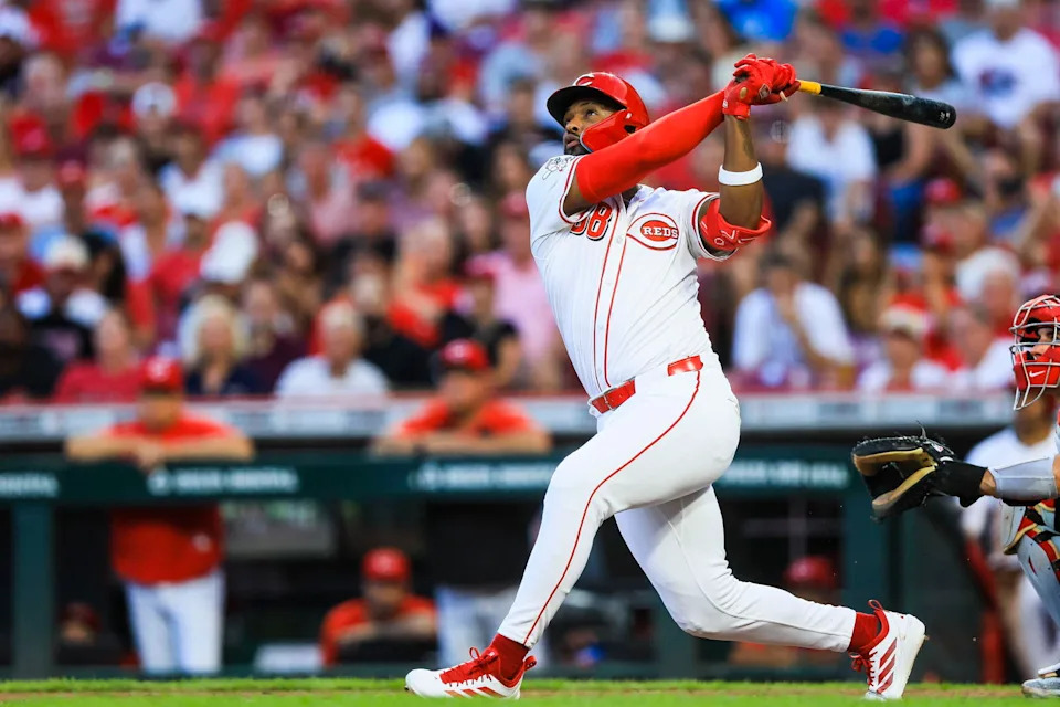 Aug 13, 2025; Cincinnati, Ohio, USA; Cincinnati Reds designated hitter Miguel Andujar (38) hits a grand slam in the seventh inning against the Philadelphia Phillies at Great American Ball Park. Mandatory Credit: Katie Stratman-Imagn Images