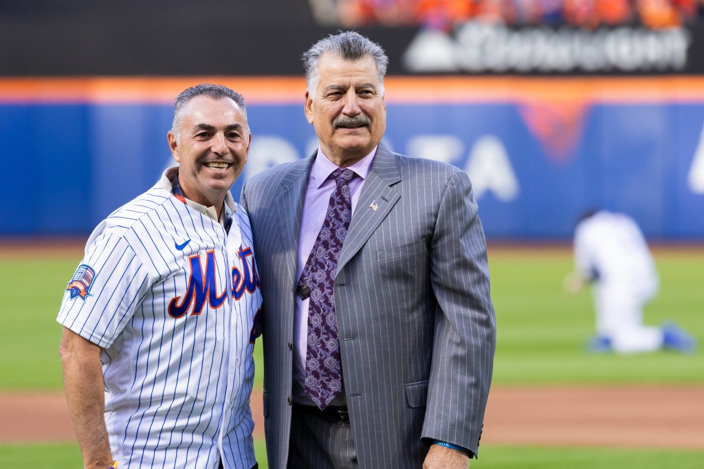 Retired New York Mets Keith Hernandez and John Franco throw out the first pitch before Game 3 of the NLDS playoffs against the Philadelphia Phillies at Citi Filed, Tuesday, Oct. 8, 2024, in Queens, NY. 