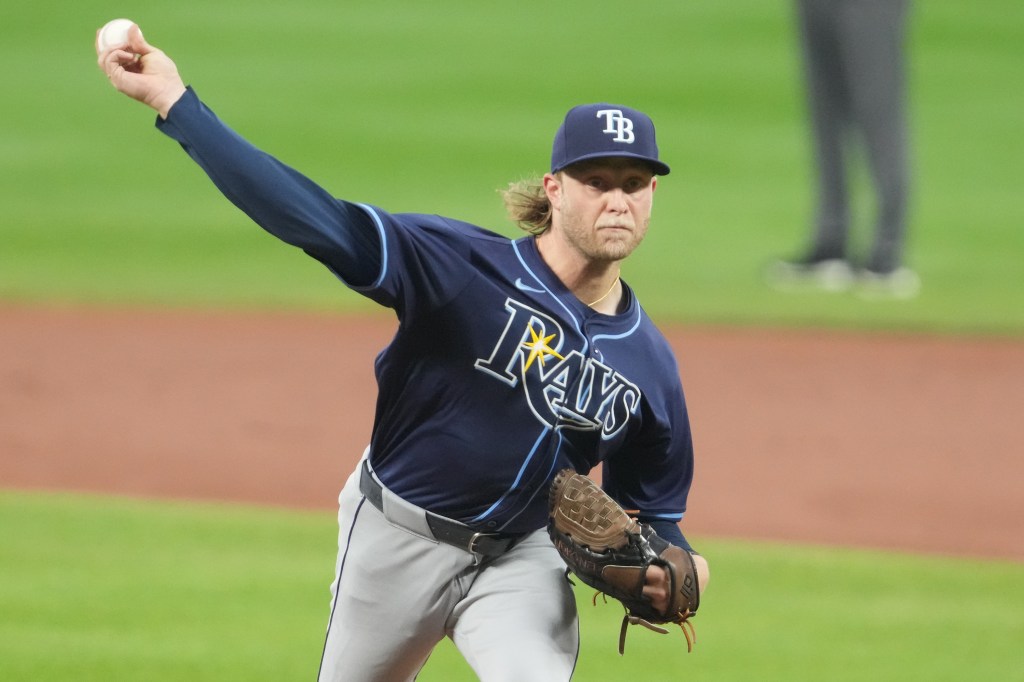 A Tampa Bay Rays pitcher throws a baseball.
