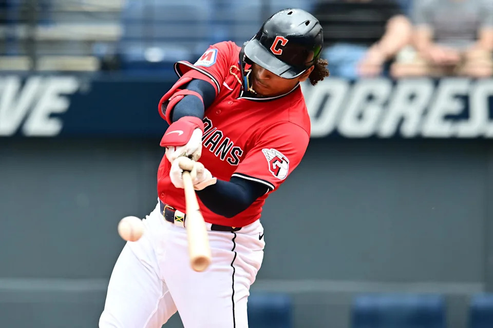 Jun 8, 2025; Cleveland, Ohio, USA; Cleveland Guardians catcher Bo Naylor (23) hits a home run during the second inning against the Houston Astros at Progressive Field. Mandatory Credit: Ken Blaze-Imagn Images