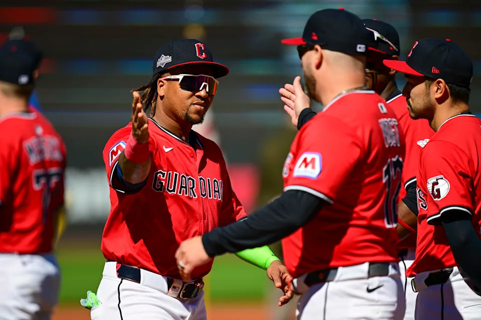 Sep 30, 2025; Cleveland, Ohio, USA; Cleveland Guardians third base Jose Ramírez (11) greets manager Stephen Vogt while being introduced before game one of the Wildcard round for the 2025 MLB playoffs against the Detroit Tigers at Progressive Field. Mandatory Credit: David Dermer-Imagn Images