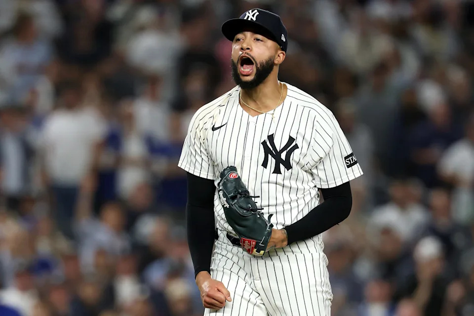 NEW YORK, NEW YORK - OCTOBER 07: Devin Williams #38 of the New York Yankees reacts after a strike out against the Toronto Blue Jays during the seventh inning in game three of the American League Division Series at Yankee Stadium on October 07, 2025 in the Bronx borough of New York City. (Photo by Al Bello/Getty Images)