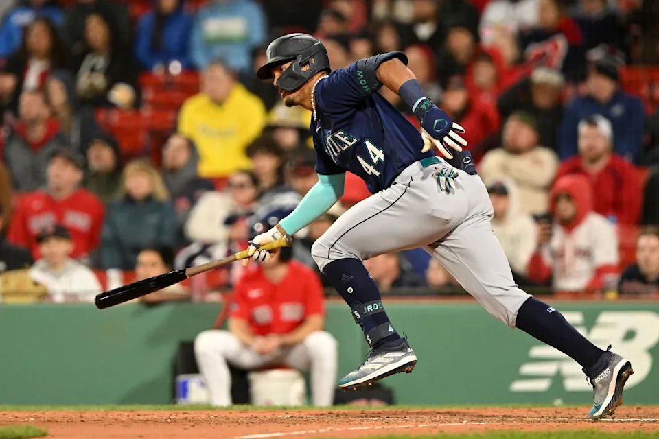 May 17, 2023; Boston, Massachusetts, USA; Seattle Mariners center fielder Julio Rodriguez (44) watches the ball after hitting a two run RBI against the Boston Red Sox during the sixth inning at Fenway Park. (Brian Fluharty/Imagn Images)