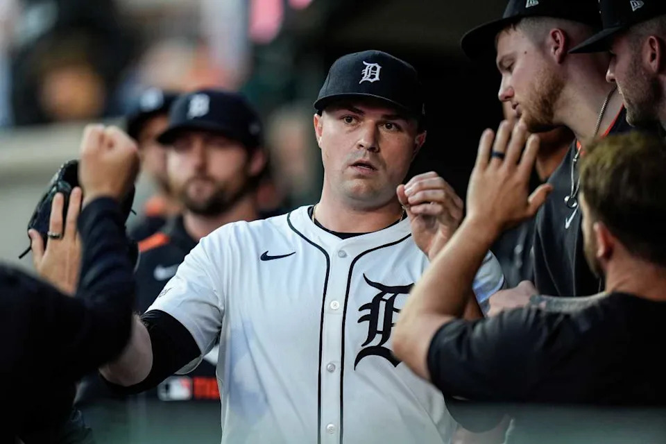 Detroit Tigers pitcher Tarik Skubal high-fives teammates in the dugout after a pitching change during the seventh inning at Comerica Park in Detroit on Wednesday, May 14, 2025.