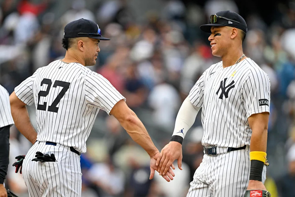 New York Yankees designated hitter Giancarlo Stanton (27) celebrates with right fielder Aaron Judge (99)© Mark Smith-Imagn Images