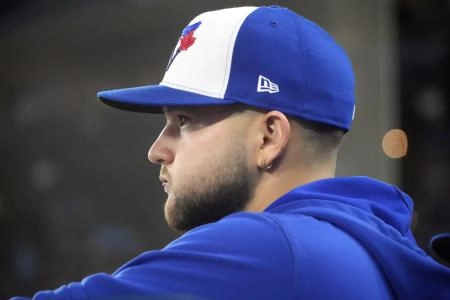 Oct 12, 2025; Toronto, Ontario, CAN; Toronto Blue Jays short stop Bo Bichette (11) looks on during game one of the ALCS round for the 2025 MLB playoffs at Rogers Centre. Mandatory Credit: John E. Sokolowski-Imagn Images