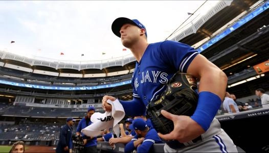 Toronto Blue Jays infielder Jake Lamb runs out onto the field at Yankee Stadium in the Bronx New York, USA. Toronto Blue Jays infielder Jake Lamb runs out onto the field at Yankee Stadium in the Bronx New York, USA.