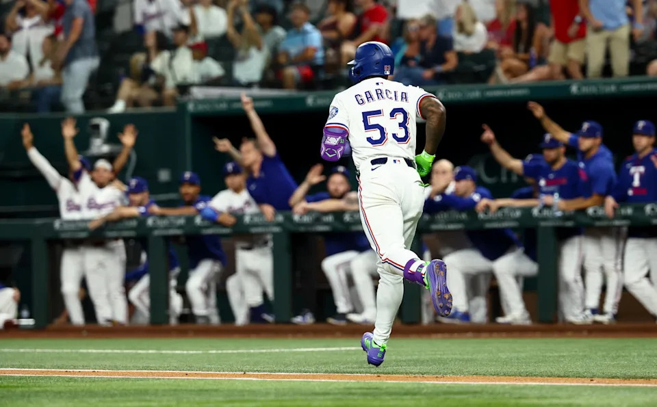 Aug 27, 2025; Arlington, Texas, USA; Texas Rangers right fielder Adolis Garcia (53) runs the bases after hitting a three-run home run during the first inning against the Los Angeles Angels at Globe Life Field. Mandatory Credit: Kevin Jairaj-Imagn Images