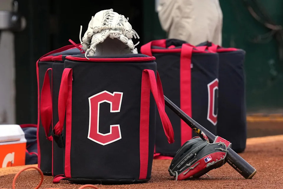 Mar 30, 2024; Oakland, California, USA; Cleveland Guardians equipment sits in front of the dugout before the game against the Oakland Athletics at Oakland-Alameda County Coliseum. Mandatory Credit: Darren Yamashita-Imagn Images