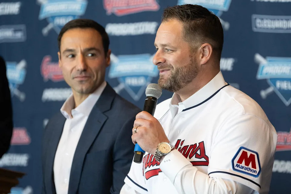 Nov 10, 2023; Cleveland, OH, USA; Cleveland Guardians manager Stephen Vogt, right, talks to the media as president of baseball operations Chris Antonetti looks on during an introductory press conference at Progressive Field. Mandatory Credit: Ken Blaze-Imagn Images