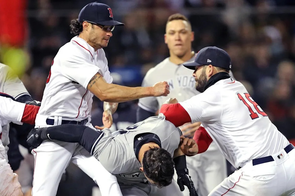 Joe Kelly (left) throws a punch at Tyler Austin during a brawl between the Yankees and Red Sox on April 11, 2018. Maddie Meyer