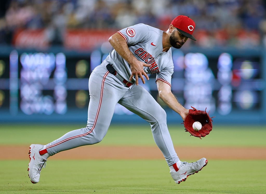 Reds pitcher Nick Martinez fields a ground ball for an out during the third inning at Dodger Stadium on Aug. 26.