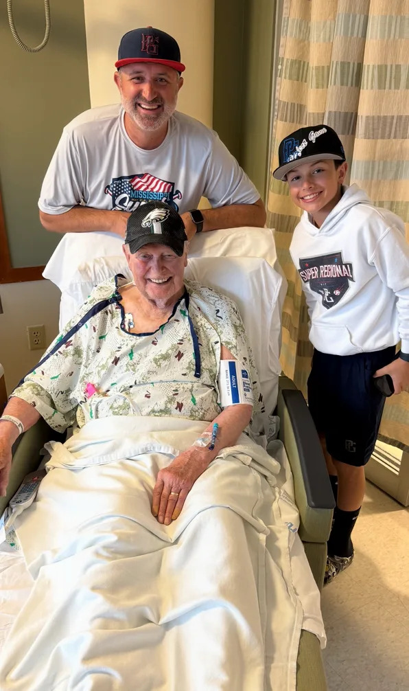 Rick Fayter, top, stands with his father, bottom, and son after his father suffered a stroke in June. Once his father started to recover, Fayter visited Card Stocks in Liberty Township where he bought a Topps Tier One box and pulled a rare Shohei Ohtani baseball card.