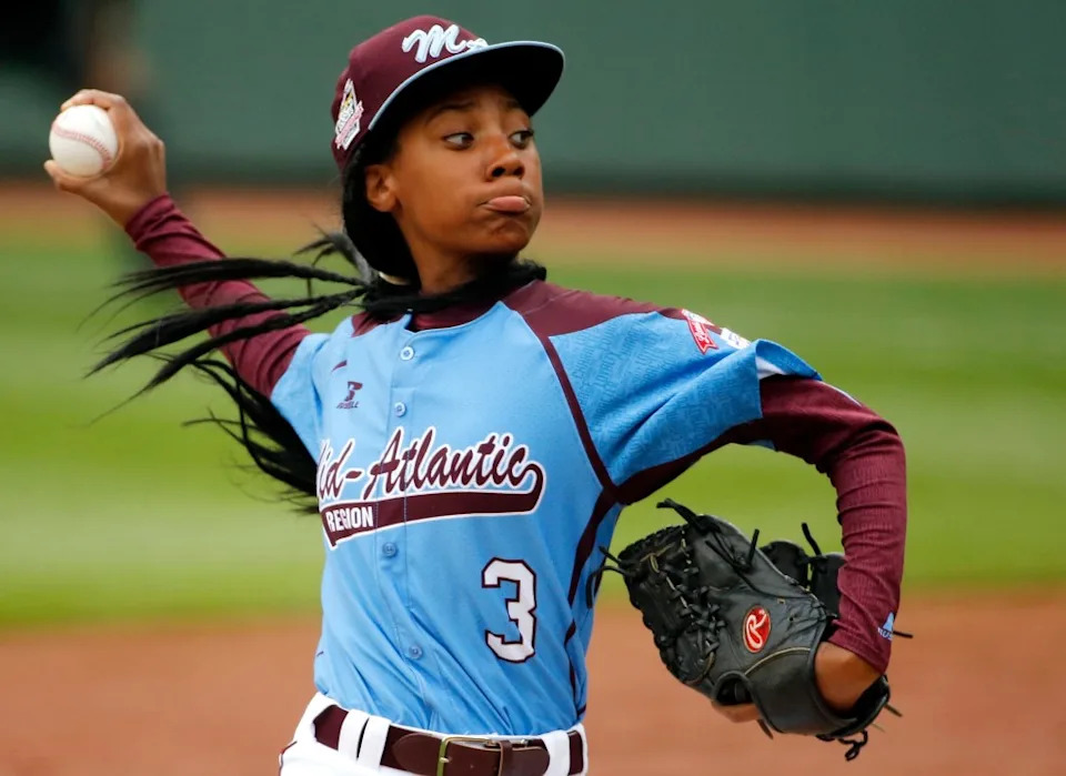 FILE – In this Aug. 15, 2014, file photo, Pennsylvania’s Mo’ne Davis throws a pitch in the fifth inning against Tennessee during a baseball game in United States pool play at the Little League World Series tournament in South Williamsport, Pa. (AP Photo/Gene J. Puskar, File)
