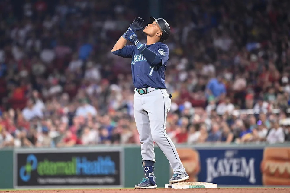Jul 30, 2024; Boston, Massachusetts, USA; Seattle Mariners second baseman Jorge Polanco (7) reacts to hitting a double during the sixth inning against the Boston Red Sox at Fenway Park. (Eric Canha/Imagn Images)