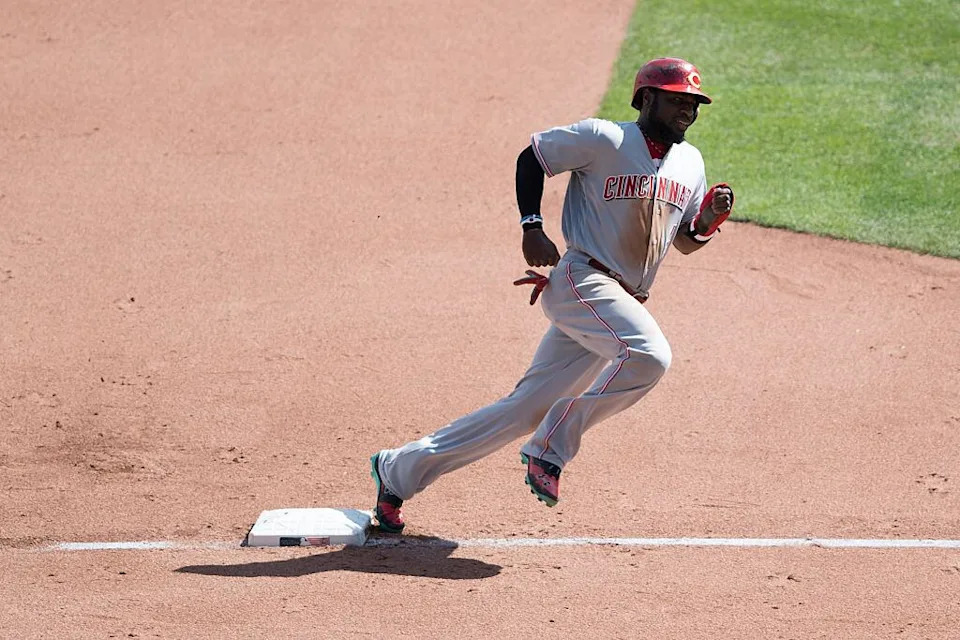 PITTSBURGH, PA - SEPTEMBER 11:  Brandon Phillips #4 of the Cincinnati Reds rounds third base as he heads towards home plate on an RBI double by Ramon Cabrera #37 in the fifth inning during the game against the Pittsburgh Pirates at PNC Park on September 11, 2016 in Pittsburgh, Pennsylvania. (Photo by Justin Berl/Getty Images)