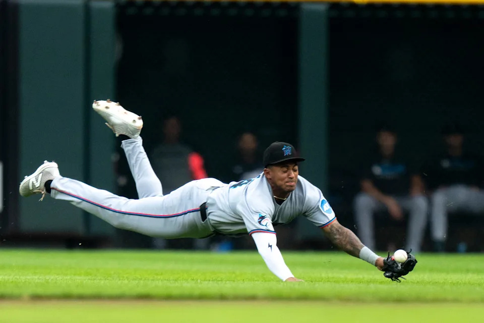 Miami's Dane Myers can't pull in a line drive during the Marlins game against the Reds at Great American Ball Park last July 9.