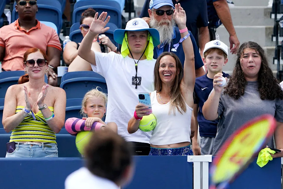 Fans cheer for Jasmine Paolini after defeating Barbora Krejcikova in the Cincinnati Open fourth round match between Jasmine Paolini and Barbora Krejcikova, Thursday, Aug. 14, 2025, at the Lindner Family Tennis Center in Mason. Paolini won 6-1, 6-2.