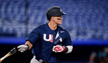 Title: Tokyo Olympics Baseball Image ID: 21211400212561 Article: United States' Tyler Austin follows the flight of the ball after hitting a home run in the third inning of a baseball game against Israel at the 2020 Summer Olympics, Friday, July 30, 2021, in Yokohama, Japan. (AP Photo/Sue Ogrocki)