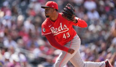 Cincinnati Reds relief pitcher Alexis Díaz throws in the eighth inning of a baseball game, April 26, 2025, in Denver. (AP Photo/David Zalubowski)