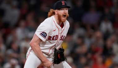 Boston Red Sox pitcher Dustin May reacts after the final out of the top of the sixth inning of a baseball game against the Baltimore Orioles at Fenway Park, Monday, Aug. 18, 2025, in Boston. (AP Photo/Charles Krupa)