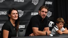 EL SEGUNDO, CALIFORNIA - SEPTEMBER 18:  Anze Kopitar of the Los Angeles Kings, accompanied by wife Ines Kopitar and their children, announces he will retire at the conclusion of the 2025-26 season during a press conference on September 18, 2025 at the Toyota Sports Performance Center in El Segundo, California. (Photo by Juan Ocampo/NHLI via Getty Images)