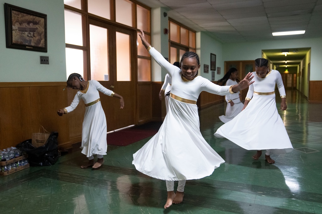 Left to right, Azarielle Jordan, Dylan Dyson, and Madisyn Montgomery practice their dances for Sister Delphine Okoro's Rite of Perpetual Profession at Our Lady of Mount Providence Convent in Arbutus, MD, Thursday, August 14, 2025.