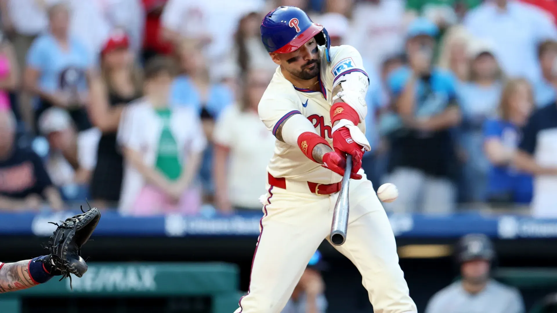Nick Castellanos #8 of the Philadelphia Phillies hits a walk-off sacrifice fly. Emilee Chinn/Getty Images