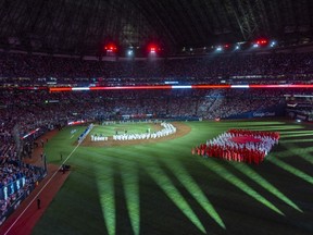 The Canadian anthem is performed at the Rogers Centre before the Toronto Blue Jays host the Los Angeles Dodgers in Game 1 of the World Series on Friday, Oct. 24, 2025.