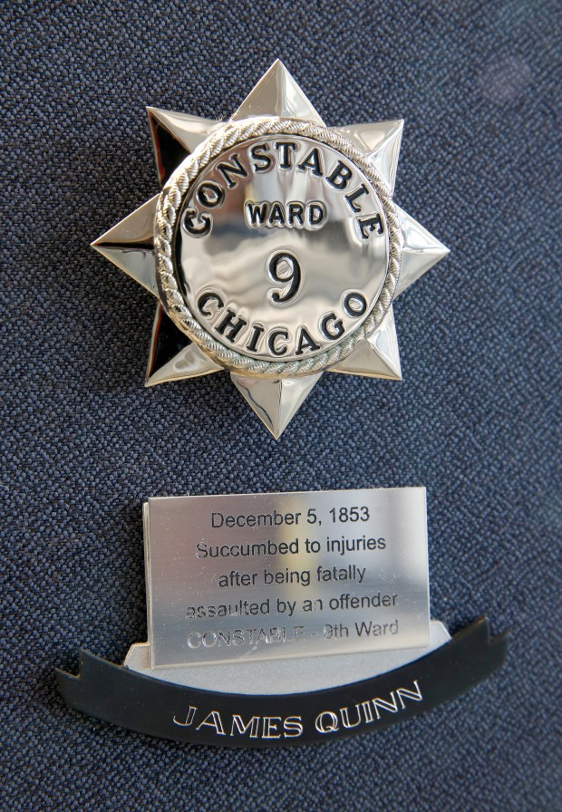 Michael Tercha / Chicago Tribune The star badge representing Chicago Constable James Quinn, killed in the line of duty Dec. 5, 1853, is displayed at Chicago police headquarters. He was the first Chicago officer killed in the line of duty. (Michael Tercha/Chicago Tribune)