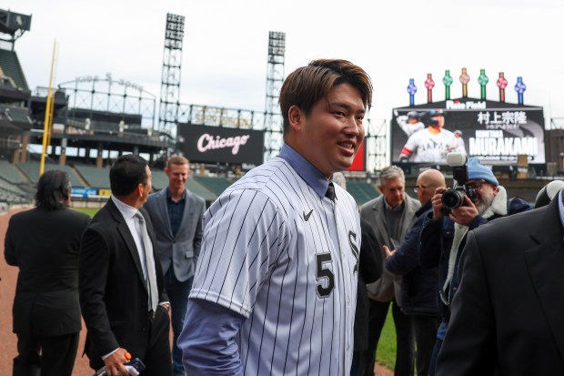 New Chicago White Sox player Munetaka Murakami stands on the field during a press conference at Rate Field on Monday, Dec. 22, 2025, announcing the acquisition of Murakami. (Eileen T. Meslar/Chicago Tribune)