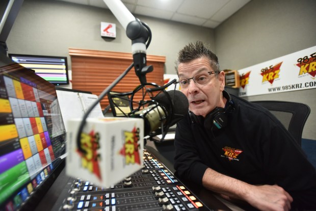 WKRZ morning host Rocky Rhodes gives his introduction into the microphone in the station's studio in Pittston Twp. Wednesday, April 30, 2025. (SEAN MCKEAG / STAFF PHOTOGRAPHER)