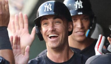 Cody Bellinger celebrates in the dugout
