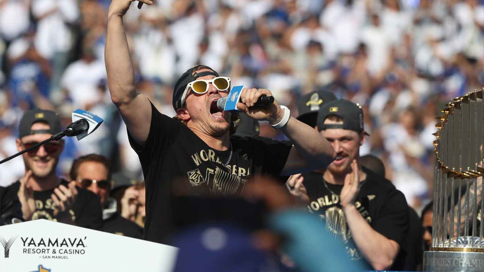 Dodgers player Kike Hernandez fires up crowd during the 2025 World Series championship celebration at Dodger Stadium in Los Angeles on Monday, Nov. 3, 2025.