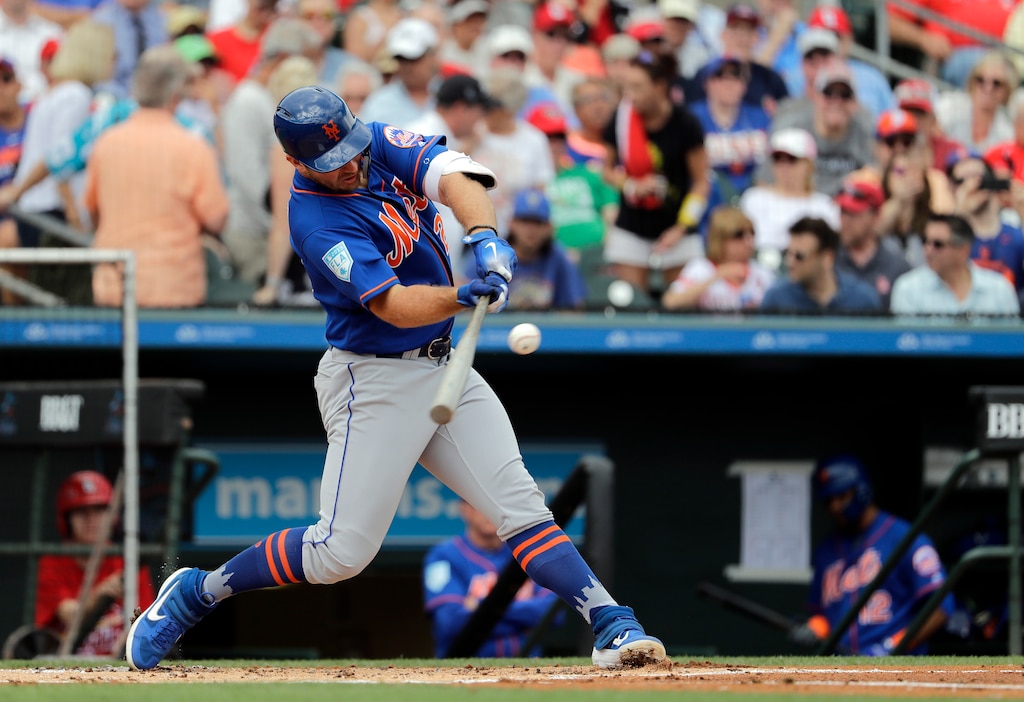 New York Mets Pete Alonso singles during the first inning of an exhibition spring training baseball game against the St. Louis Cardinals Thursday, Feb. 28, 2019, in Jupiter, Fla.