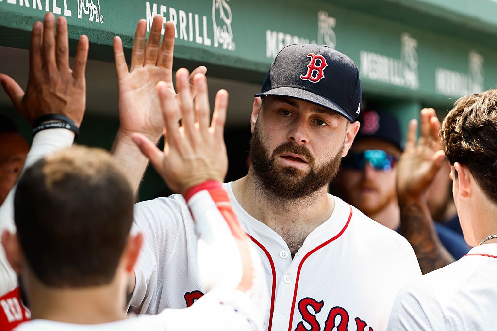 Red Sox pitcher Lucas Giolito is congratulated in the dugout after the seventh inning against the Houston Astros.