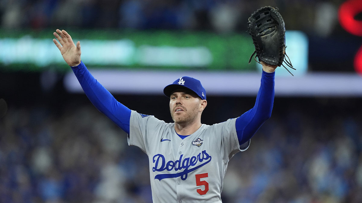 Los Angeles Dodgers first baseman Freddie Freeman (5) reacts after the catch by center fielder Andy Pages (not pictured) in the ninth inning against the Toronto Blue Jays during game seven of the 2025 MLB World Series at Rogers Centre. Mandatory Credit: John E. Sokolowski-Imagn Images