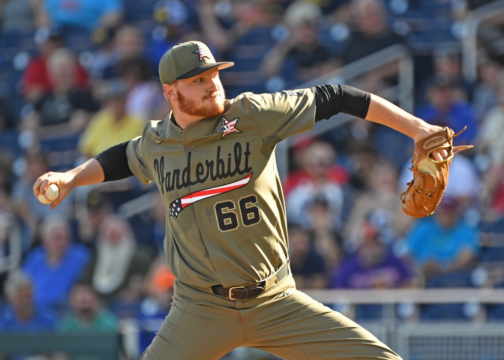 Pitcher Drake Fellows #66 of the Vanderbilt Commodores delivers a pitch in the first inning against the Michigan Wolverines during game one of the College World Series Championship Series on June 24, 2019 at TD Ameritrade Park Omaha in Omaha, Nebraska. 