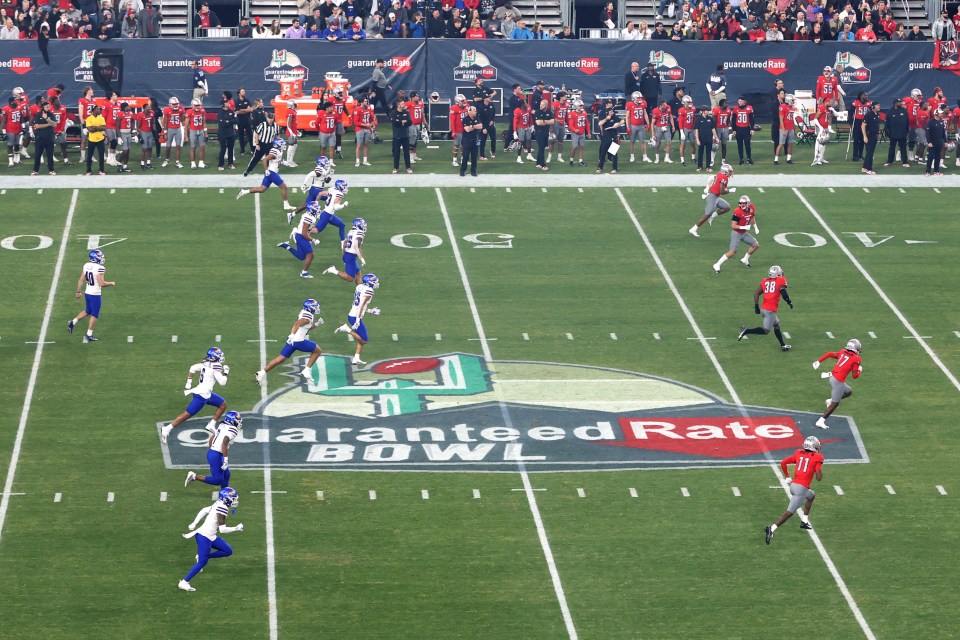 The Kansas Jayhawks kick off to start the first half of Guaranteed Rate Bowl college football game between the Kansas Jayhawks and the UNLV Rebels on December 26, 2023