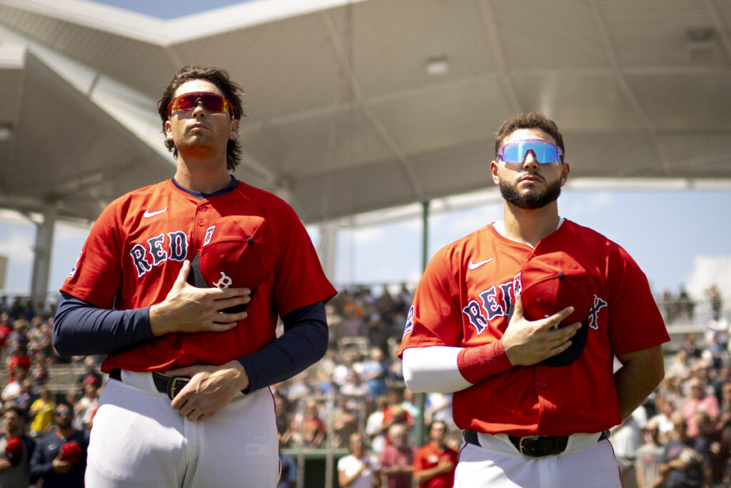 FORT MYERS, FLORIDA - MARCH 15: (L-R) Triston Casas #36 and Wilyer Abreu #52 of the Boston Red Sox look on during the National Anthem before a game against the Atlanta Braves at JetBlue Park at Fenway South in Fort Myers, Florida on March 15, 2025. (Photo by Maddie Malhotra/Boston Red Sox/Getty Images)