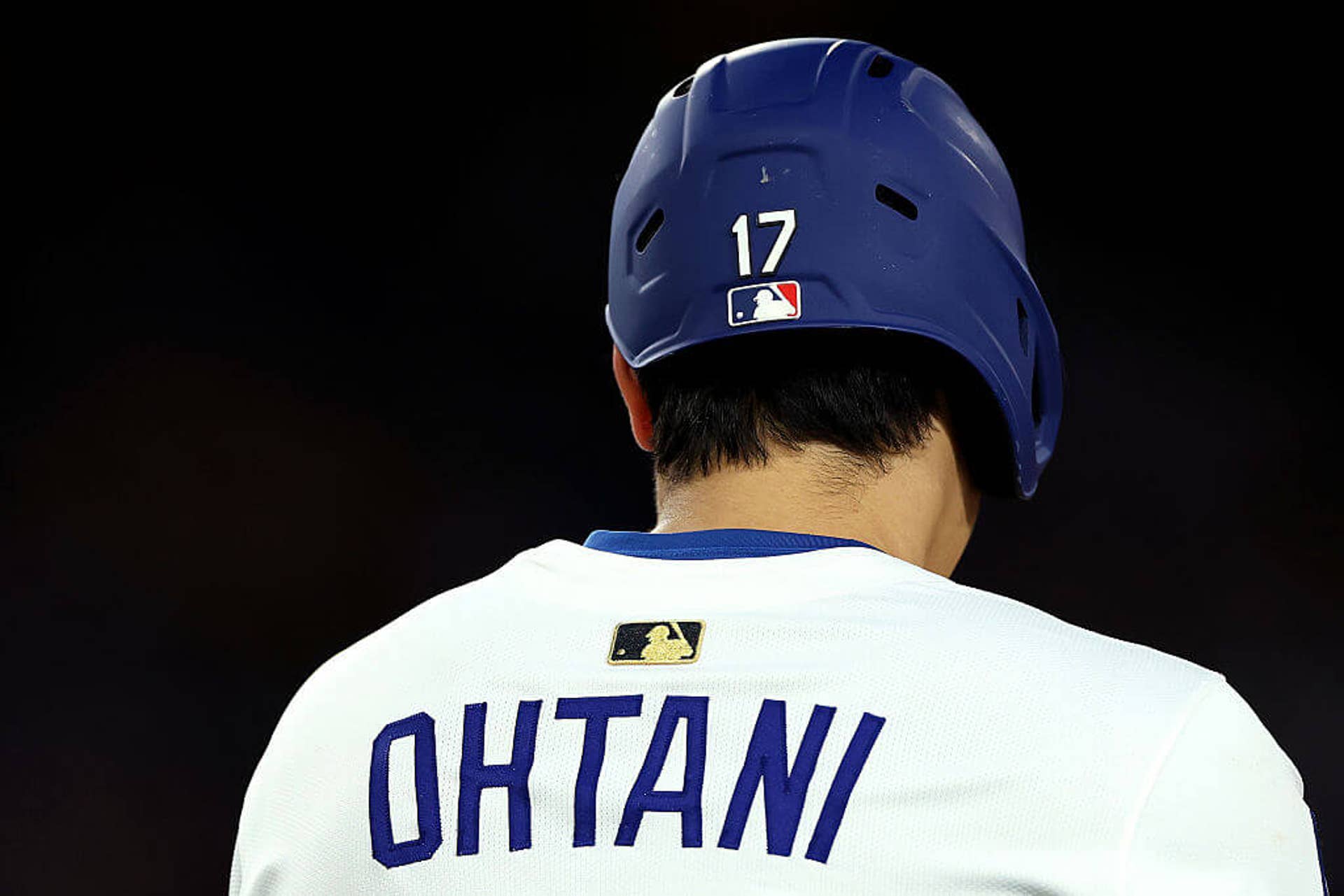 The gold MLB logo patch was taken from a jersey worn by Ohtani last season and put into a baseball card.