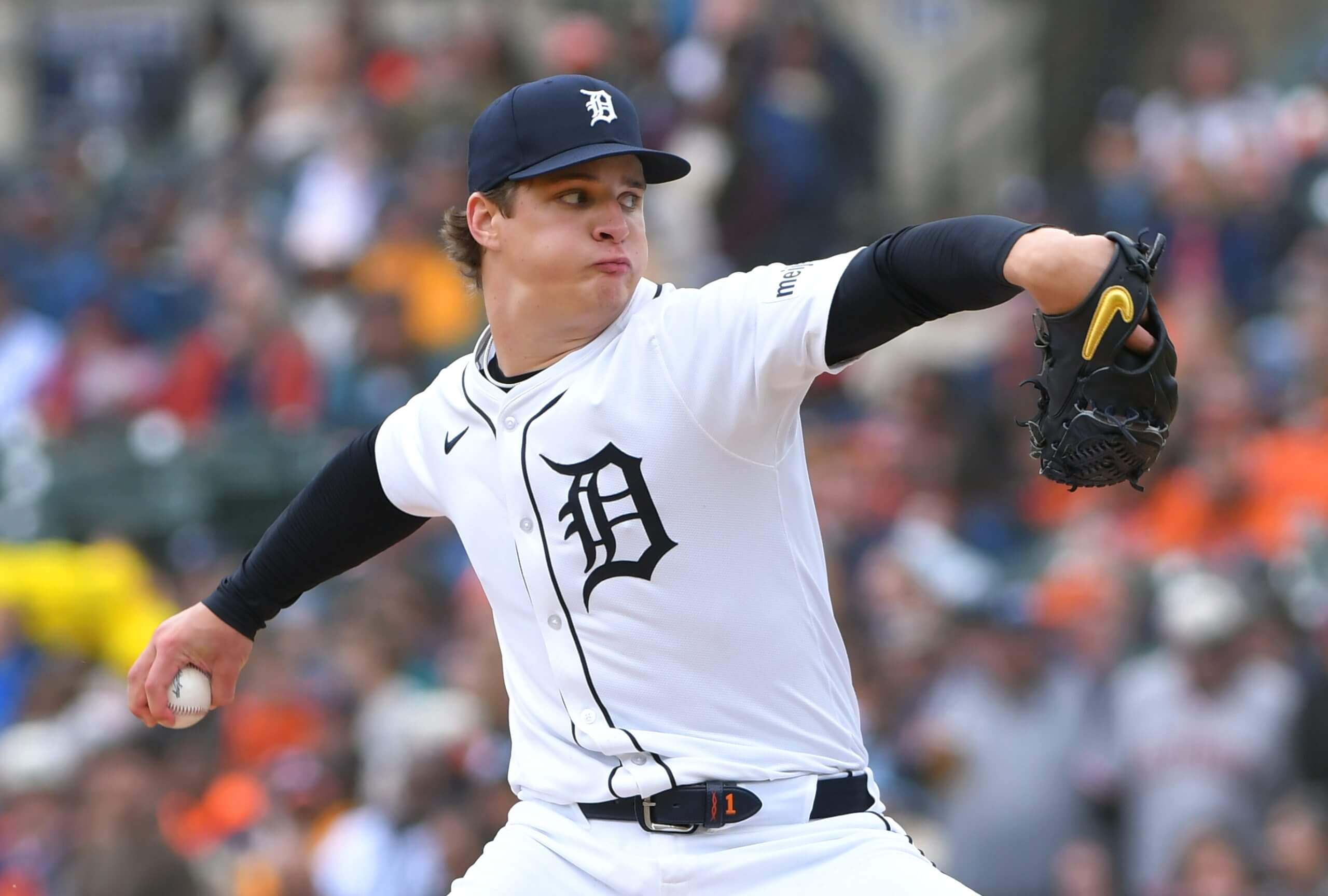 Jackson Jobe extends his arm back holding the ball as he gets ready to pitch on the mound.