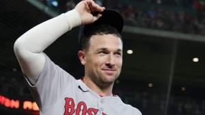 HOUSTON, TEXAS - AUGUST 11: Alex Bregman #2 of the Boston Red Sox acknowledges the crowd in his first return to Houston since being traded to the Red Sox, before action against the Houston Astros at Daikin Park on August 11, 2025 in Houston, Texas. (Photo by Alex Slitz/Getty Images)