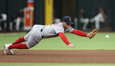 PHOENIX, ARIZONA - SEPTEMBER 06: Infielder Alex Bregman #2 of the Boston Red Sox attempts to field ...