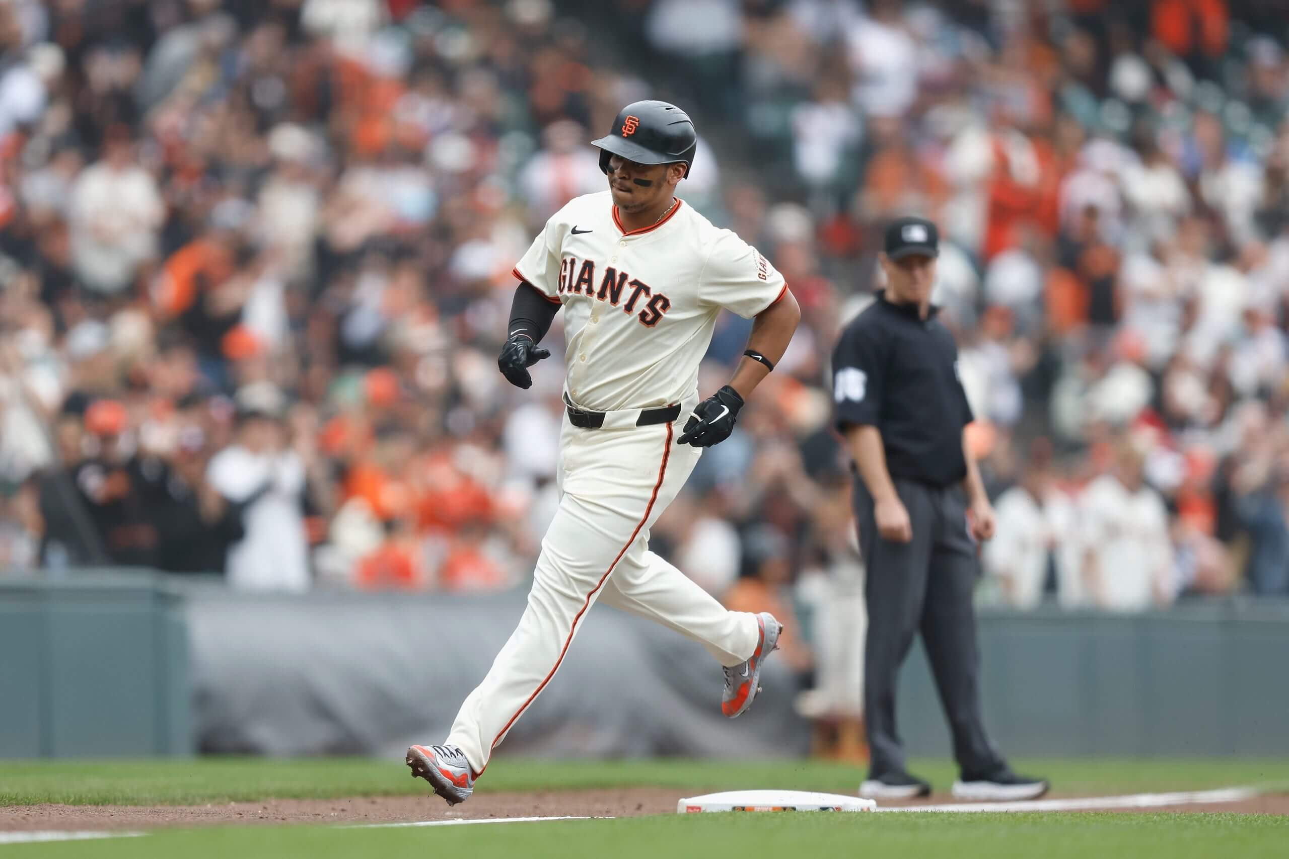 Rafael Devers circles the bases.