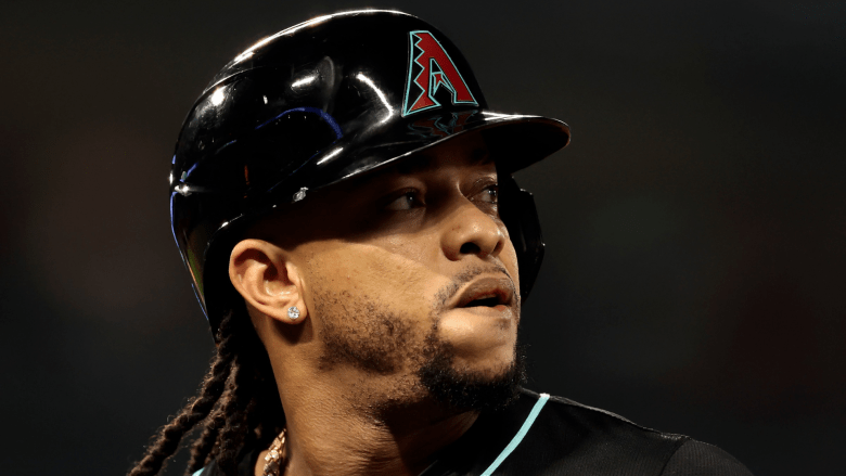 Arizona Diamondbacks second baseman Ketel Marte fields during a game amid reports of clubhouse tension and trade speculation.